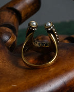 "Alexandar McQueen" Horseshoe motif red stone top ring