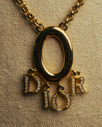 "Christian Dior" 90's-00's Gold tone logo charm pendant necklace