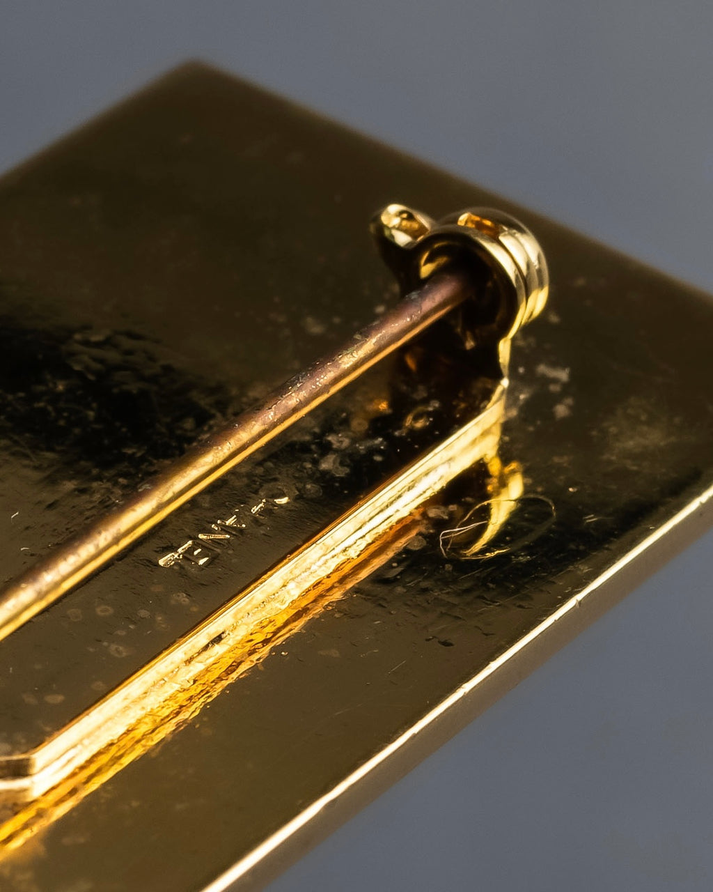 "CHANEL" Logo engraved gold plate brooch