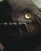“Yves Saint Laurent” 70’s-80’s Perforated logo leather tassel shoulder bag