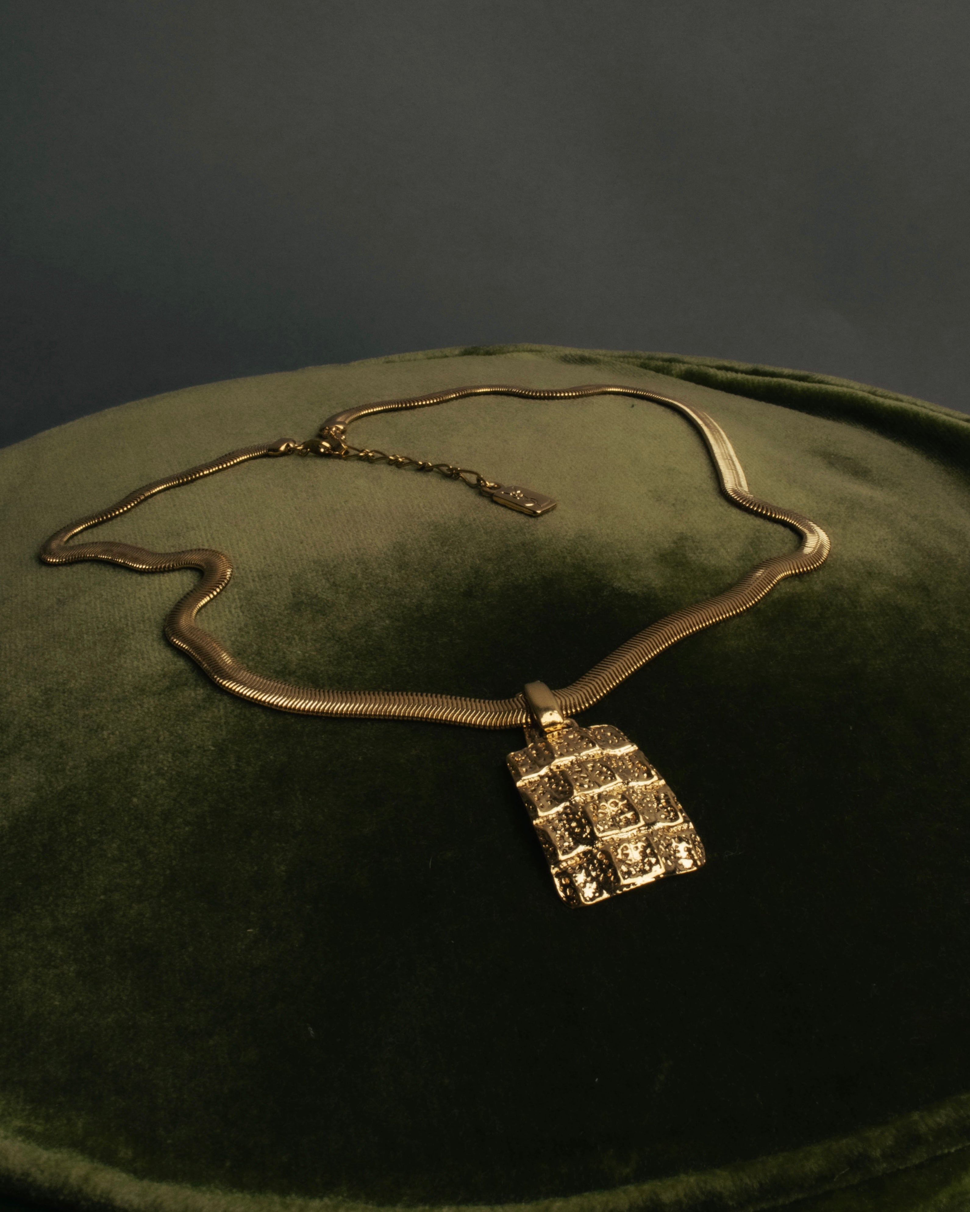 "Yves Saint Laurent" 80's-00's Gold tone textured pendant necklace
