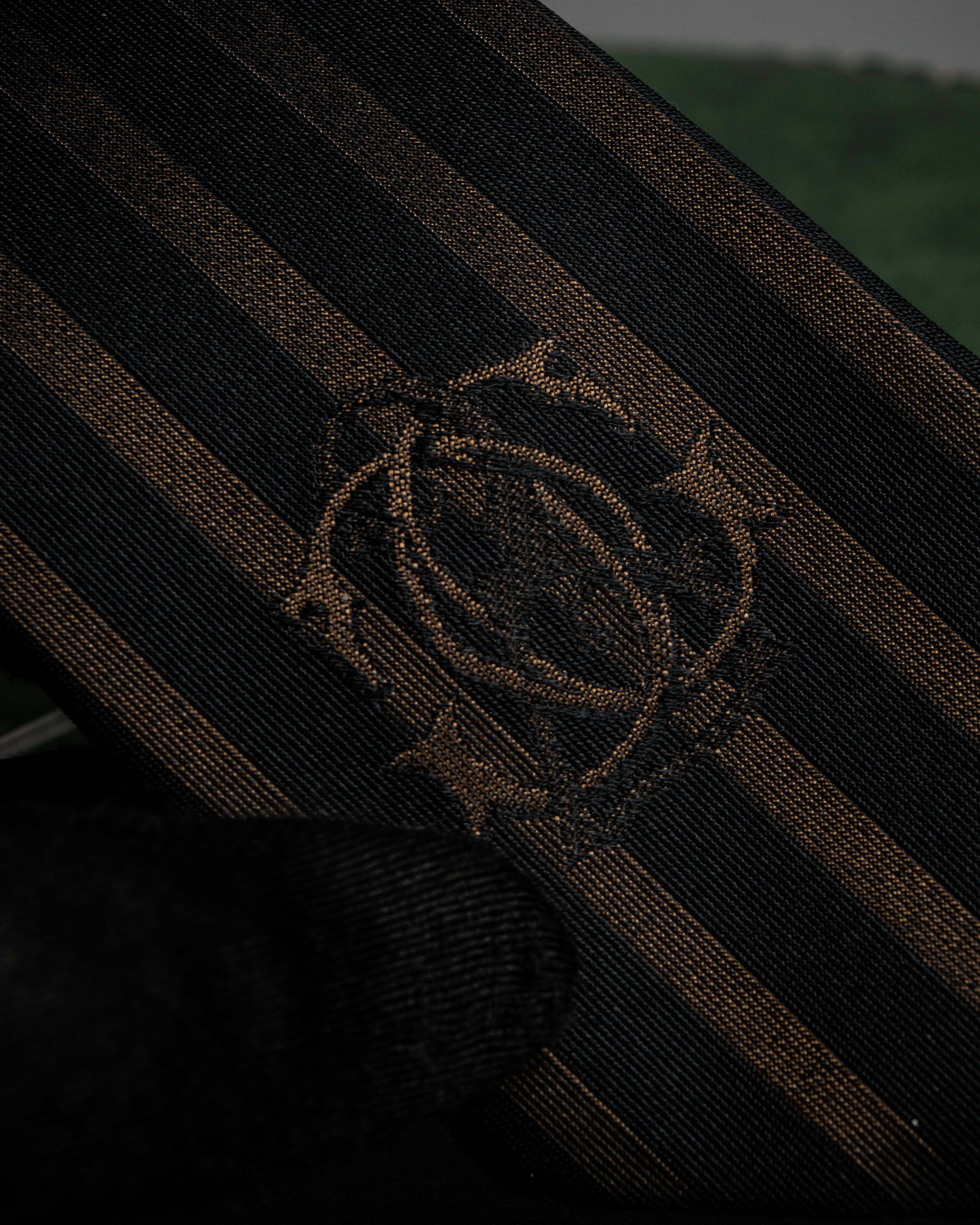 "JEAN PAUL GAULTIER" Tribal circle motif design striped silk neck tie