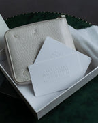 "MAISON MARGIELA" White grain leather round zipper wallet