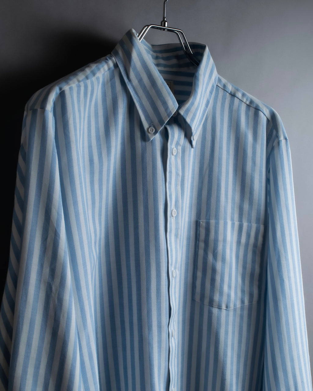 "Vintage light blue striped button-down shirt"