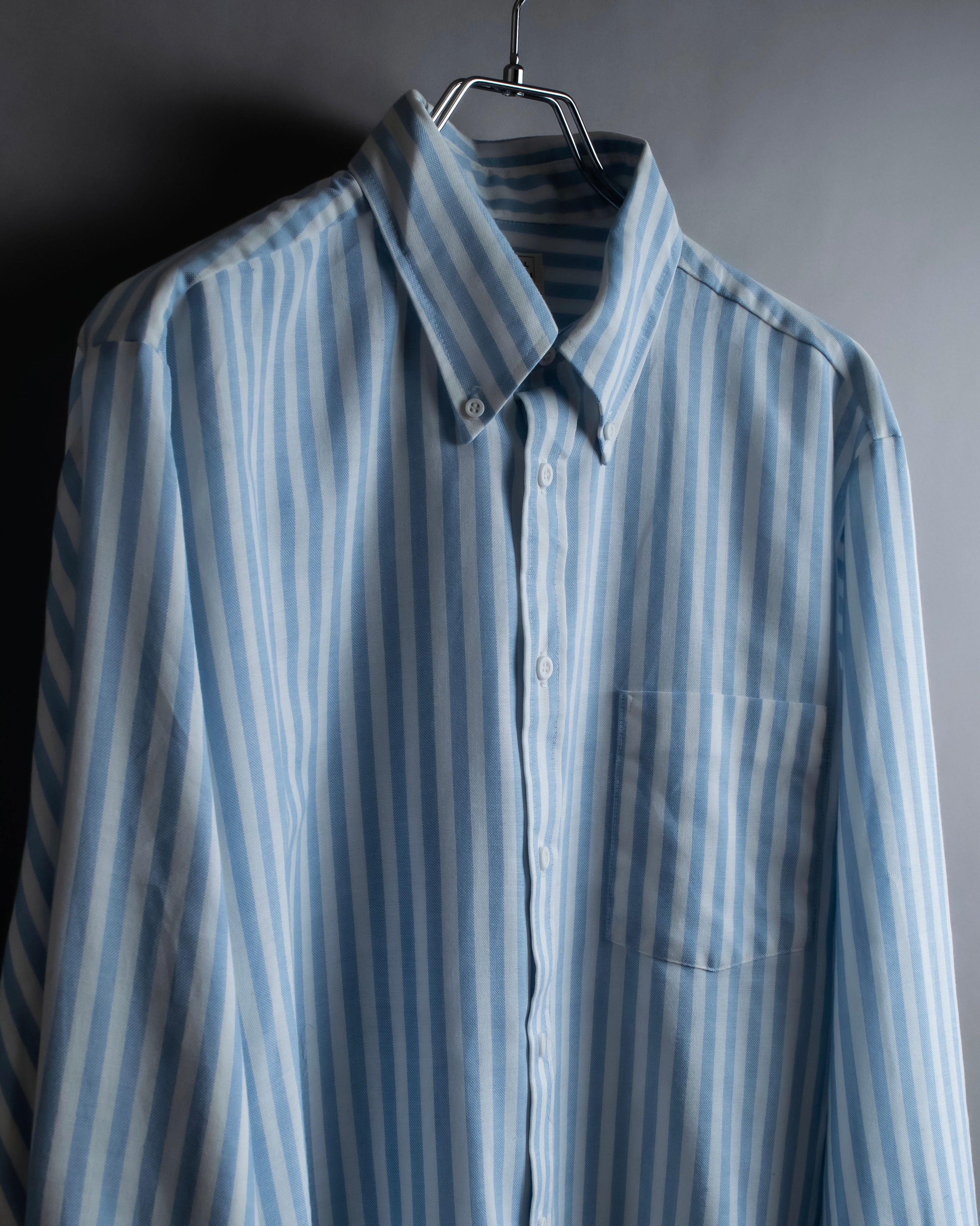 "Vintage light blue striped button-down shirt"