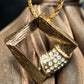 "YVES SAINT LAURENT" rhinestone motif gold necklace