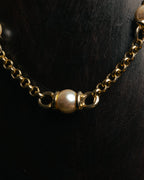 "YVES SAINT LAURENT" 80's-90's Gold-tone rolo chain necklace with faux pearl accents
