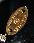 "CHANEL" Black camellia motif brooch