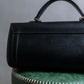 "BURBERRYS" Cylindrical design logo engraved leather one handle bag