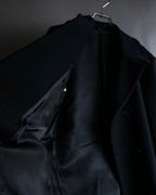 "JOHN LAWRENCE SULLIVAN"
 Large lapel double-breasted mid length coat