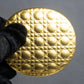 "Christian Dior" Cannage pattern engraved gold hand mirror