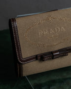 "PRADA" Logo engraved canvas＆leather combination short wallet
