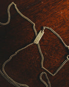 "Saint Laurent" 10's-20's Sculptural doll pendant necklace