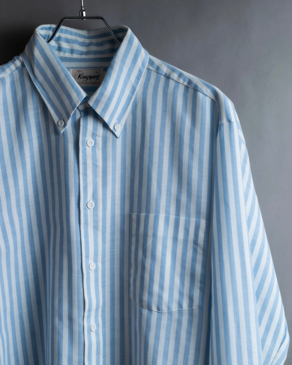 "Vintage light blue striped button-down shirt"