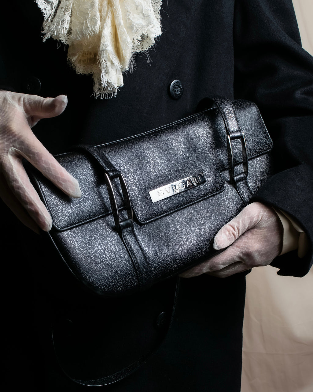 "BVLGARI" Horizontal form engraved logo leather bag