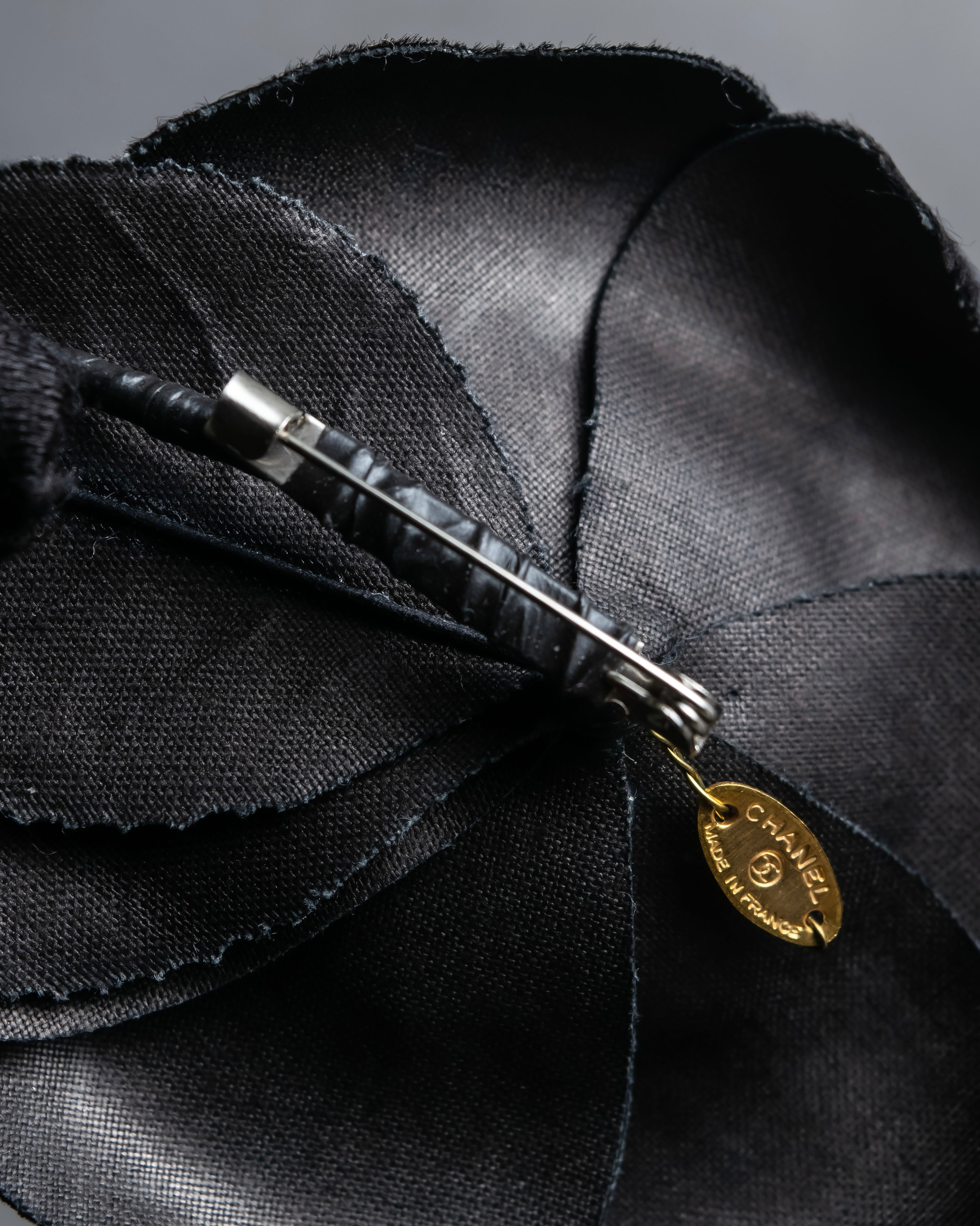 "CHANEL" Black camellia motif brooch