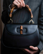 "GUCCI" Black leather bamboo handbag