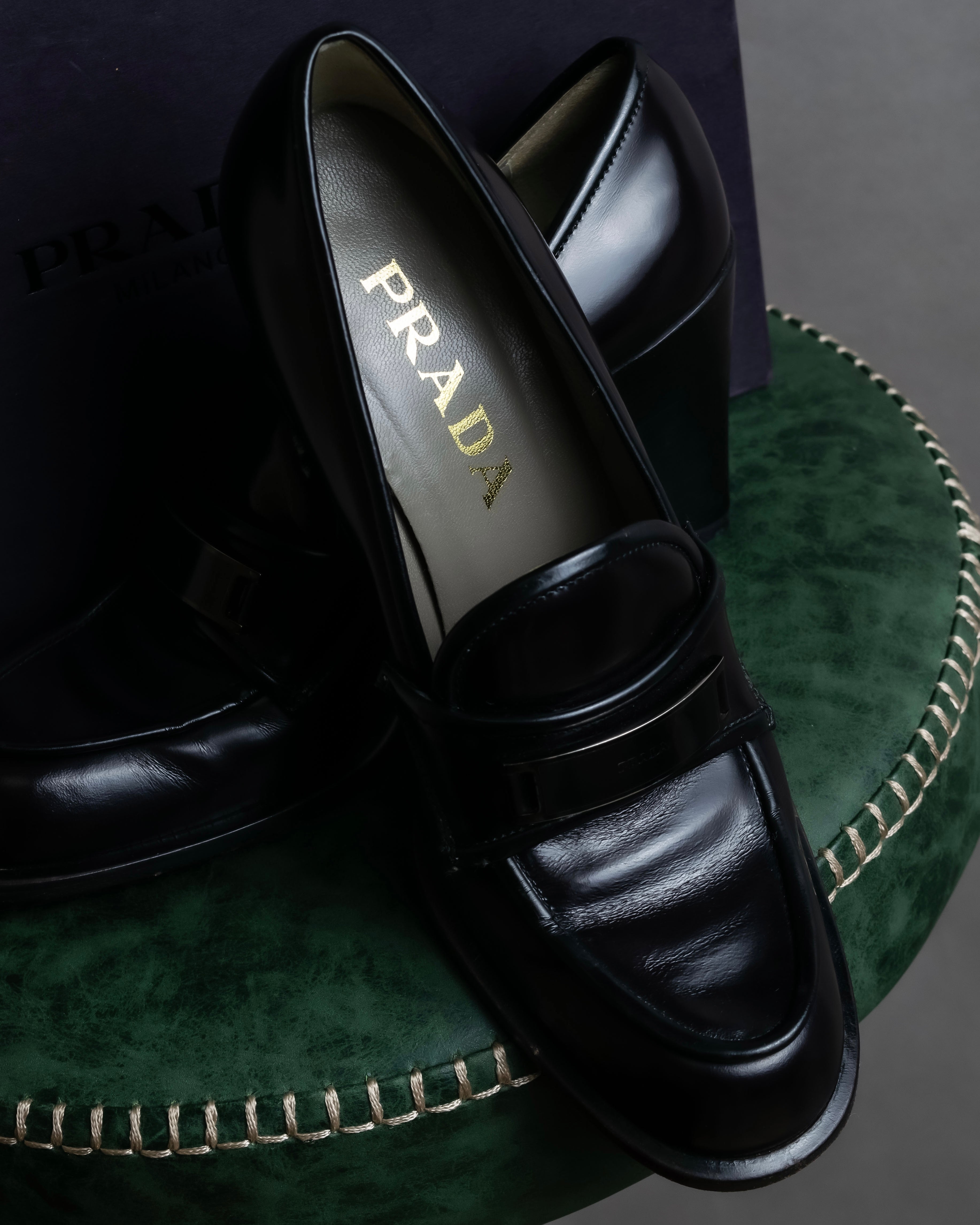 "PRADA" Metal band design leather heel loafers