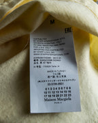 "MAISON MARGIELA"
Pastel yellow color box silhouette T-shirt