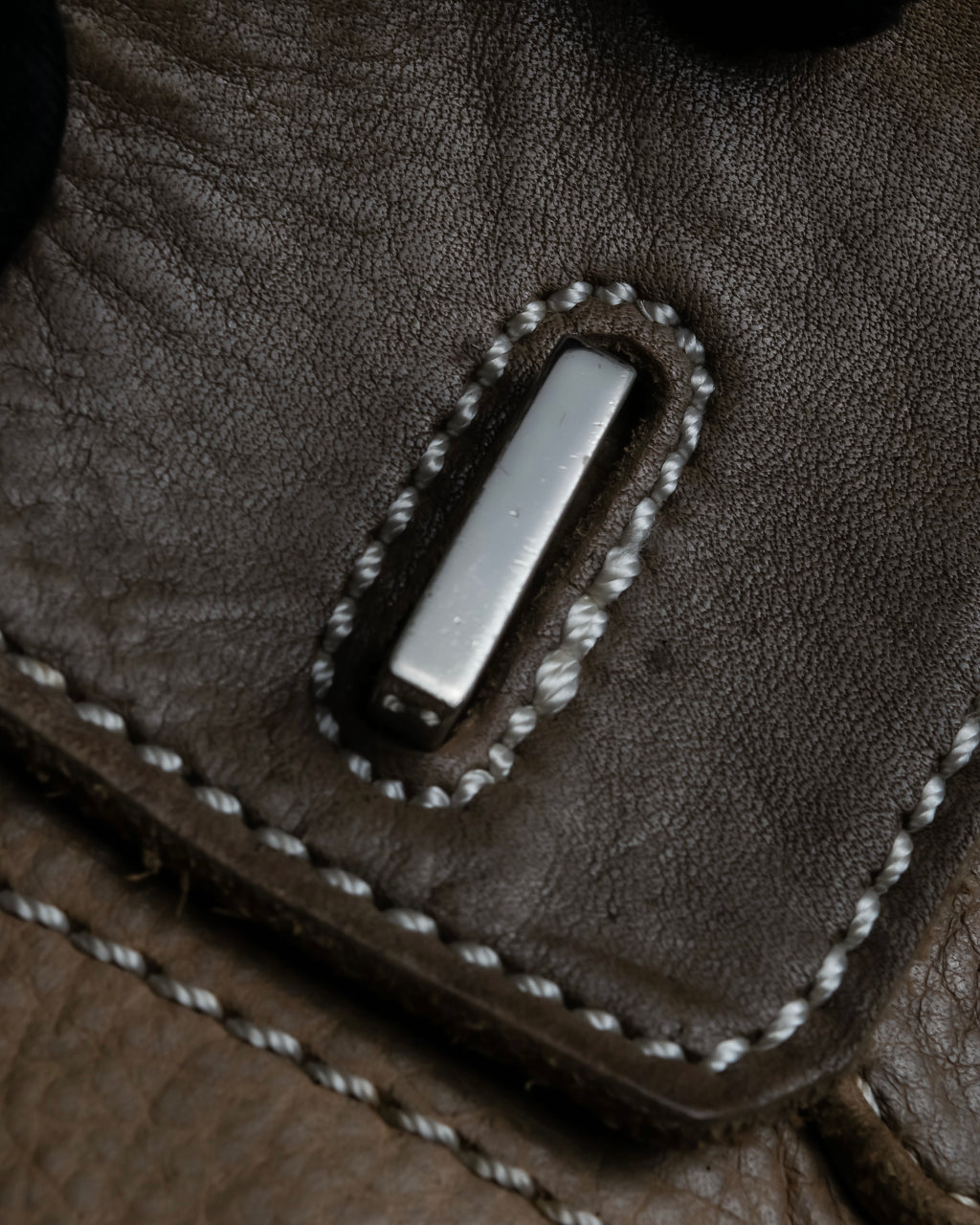 "Mademoiselle Accessories"
 Silver parts design leather one handle bag