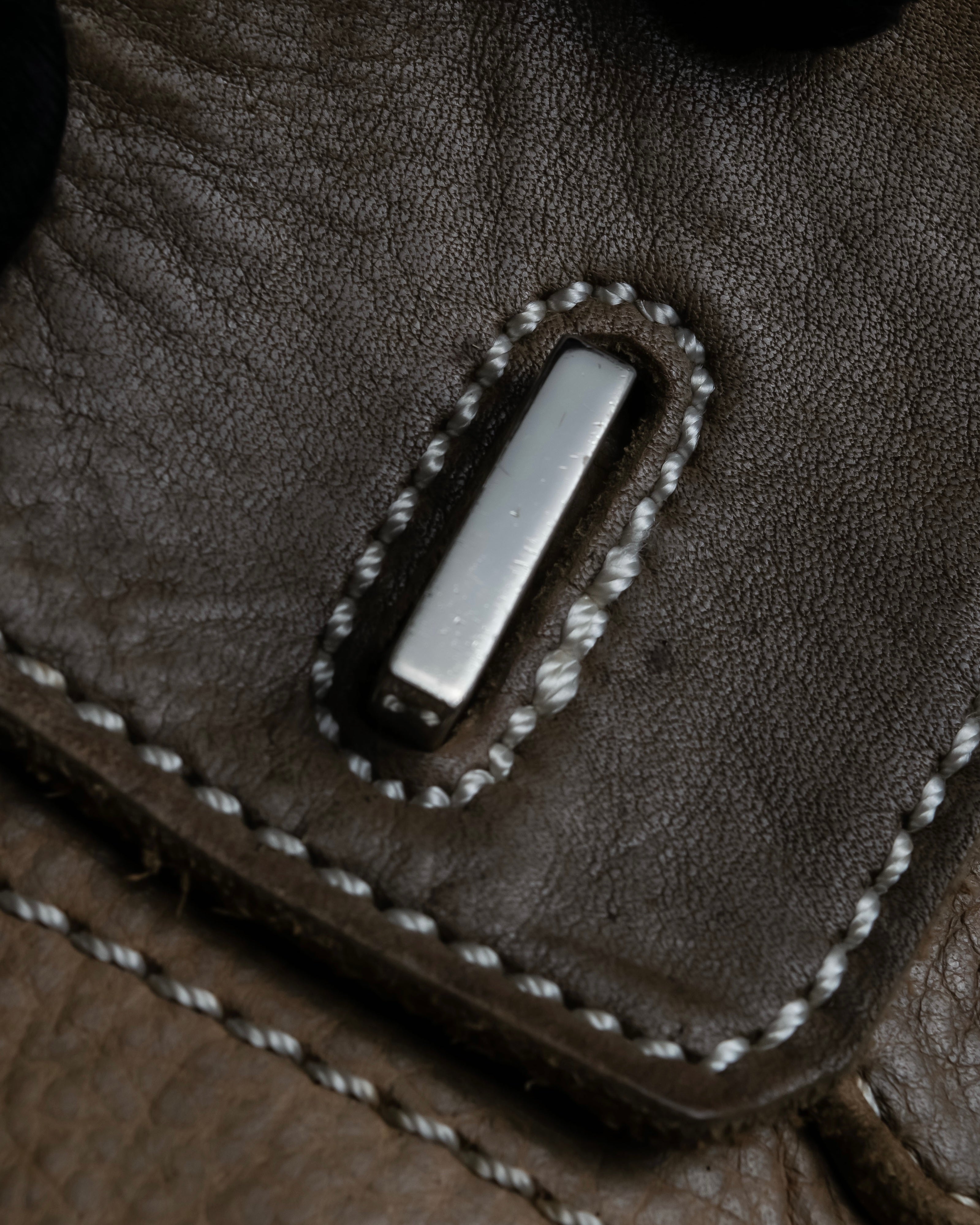 "Mademoiselle Accessories"
 Silver parts design leather one handle bag