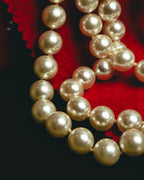 "Salvatore Ferragamo" 80's-90's Gancini three-strand pearl-style necklace
