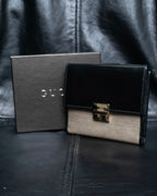"GUCCI" Canvas and leather bi-fold wallet