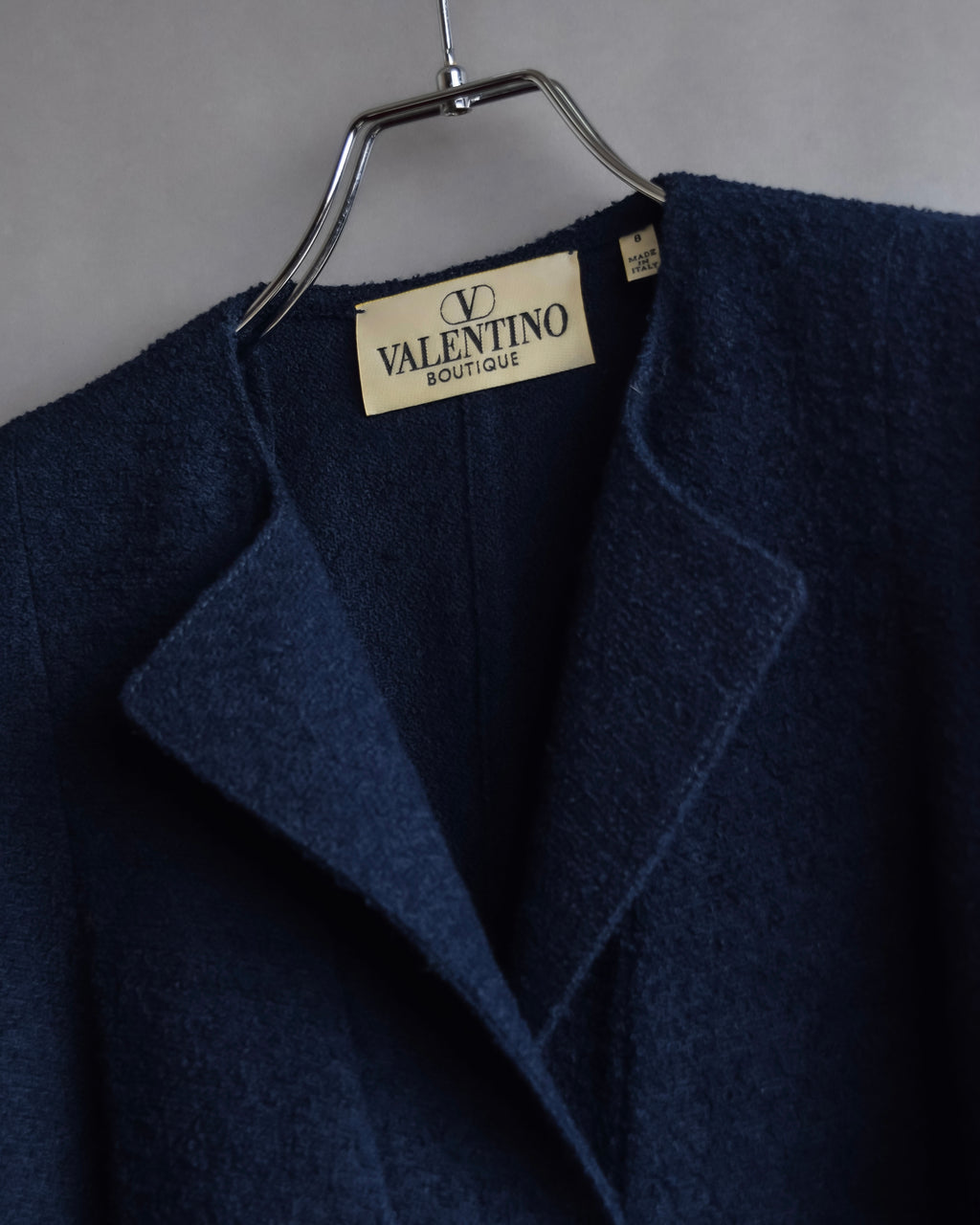 "VALENTINO" Wool boucle concealed front tailored jacket