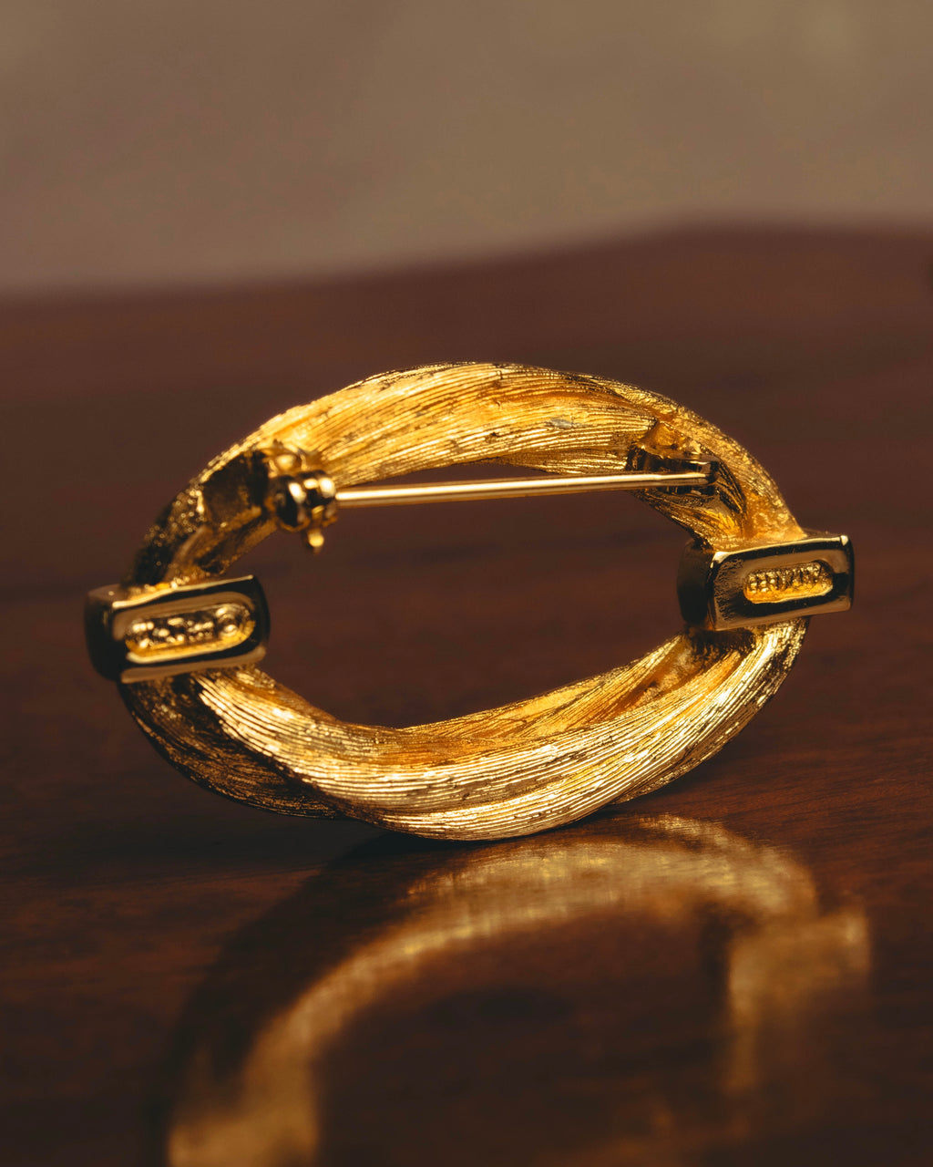"Christian Dior" 70's Textured gold tone brooch