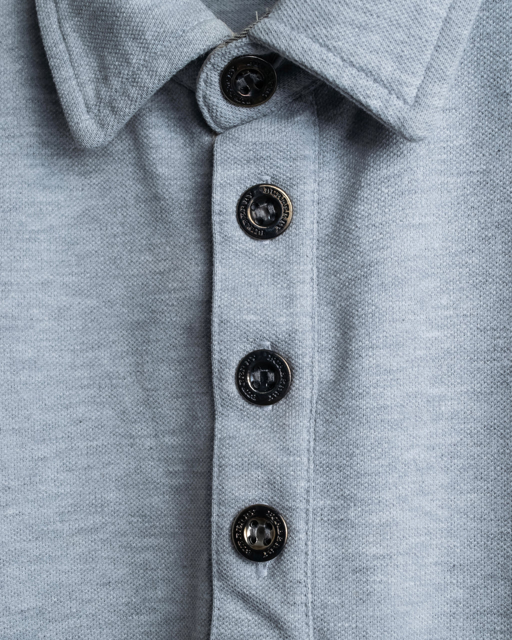 "BURBERRY" Knight logo engraved metal button polo shirt