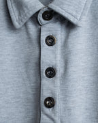 "BURBERRY" Knight logo engraved metal button polo shirt