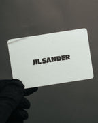 “JIL SANDER” 2021 sculptural ribbon metal clip earrings