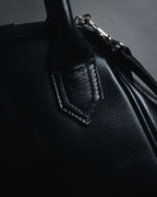 "Y’s" 22AW sculptural kiss-lock leather bag