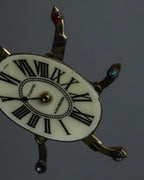 "Jerry Robertson design clock motif brooch"
