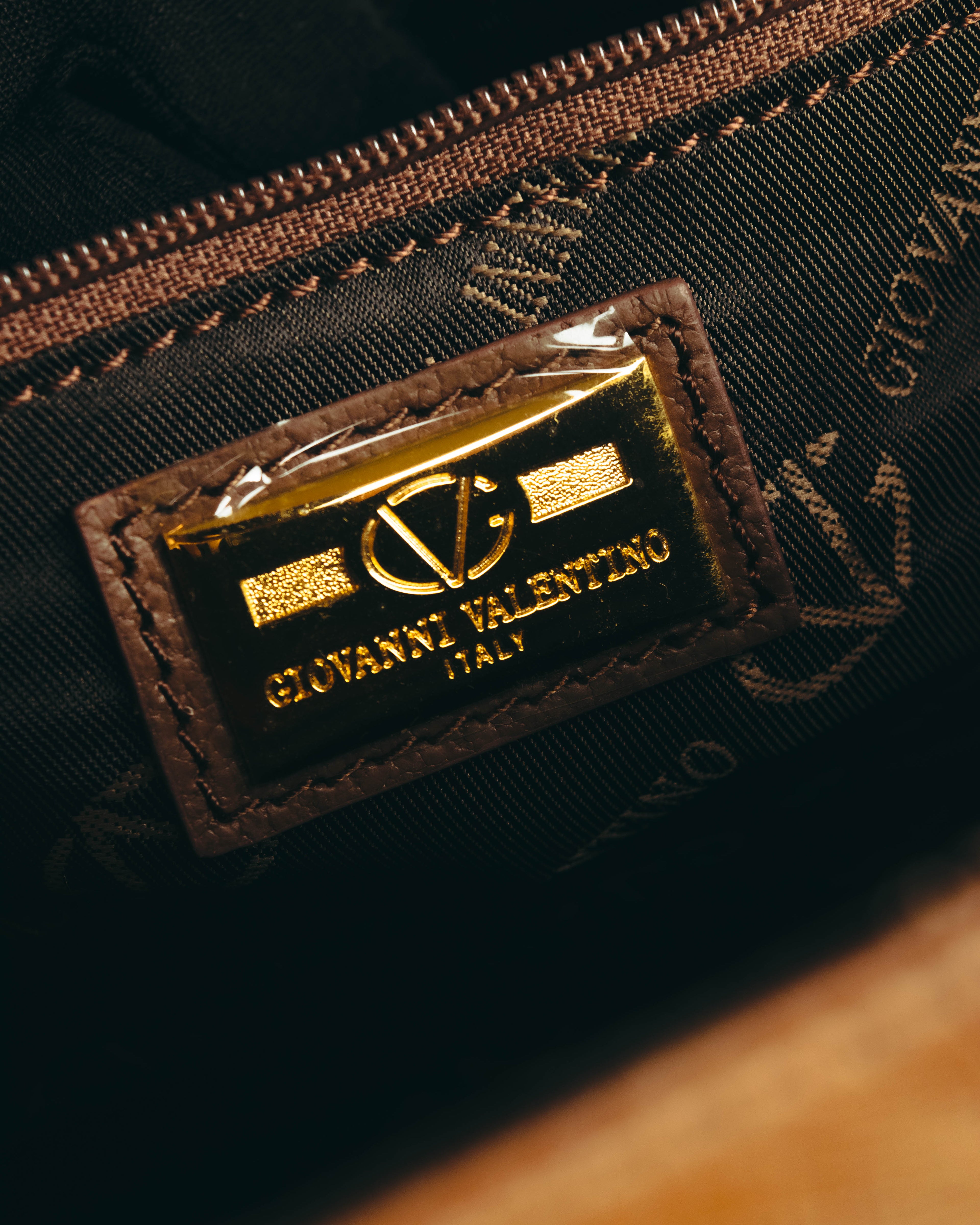 “GIOVANNI VALENTINO” Structured ostrich top handle bag