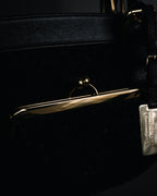 "DOLCE & GABBANA" 2005-06 Anniversary lace kisslock leather handbag