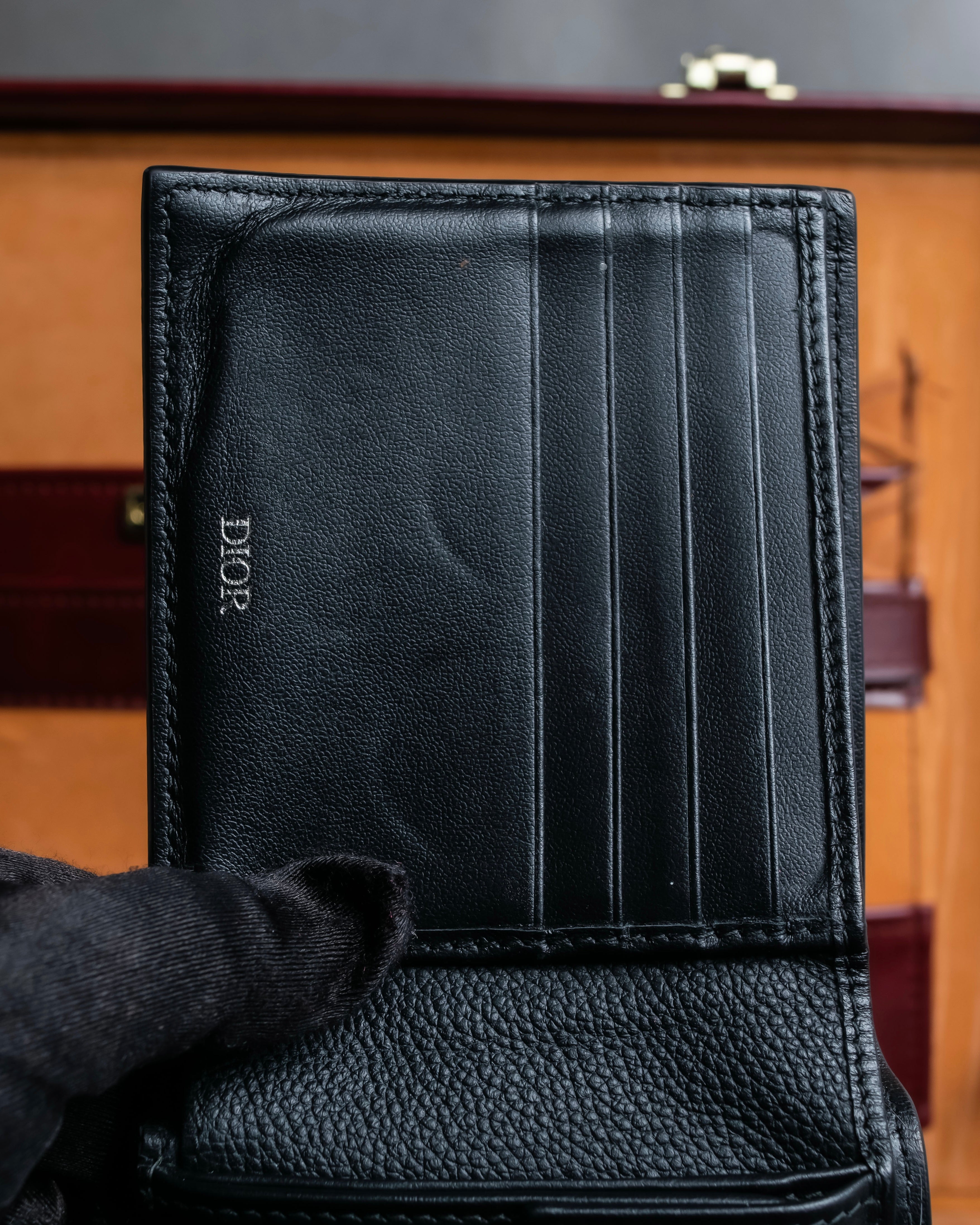 "Dior" Logo engraved bi-fold leather wallet