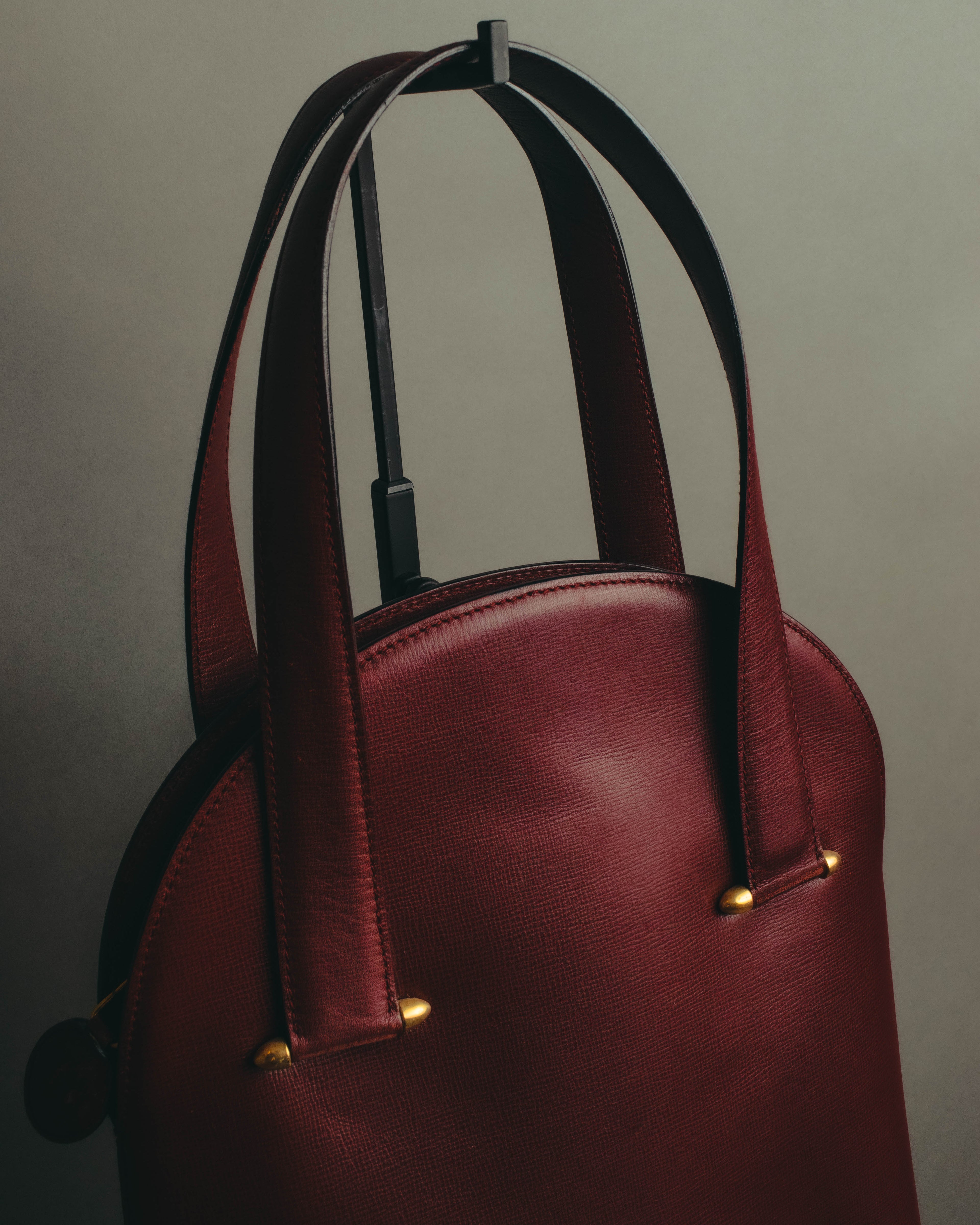 "Cartier" 80's-90's Bordeaux leather handbag