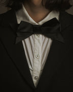 "CHANEL" 90’s black satin and grosgrain ribbon brooch