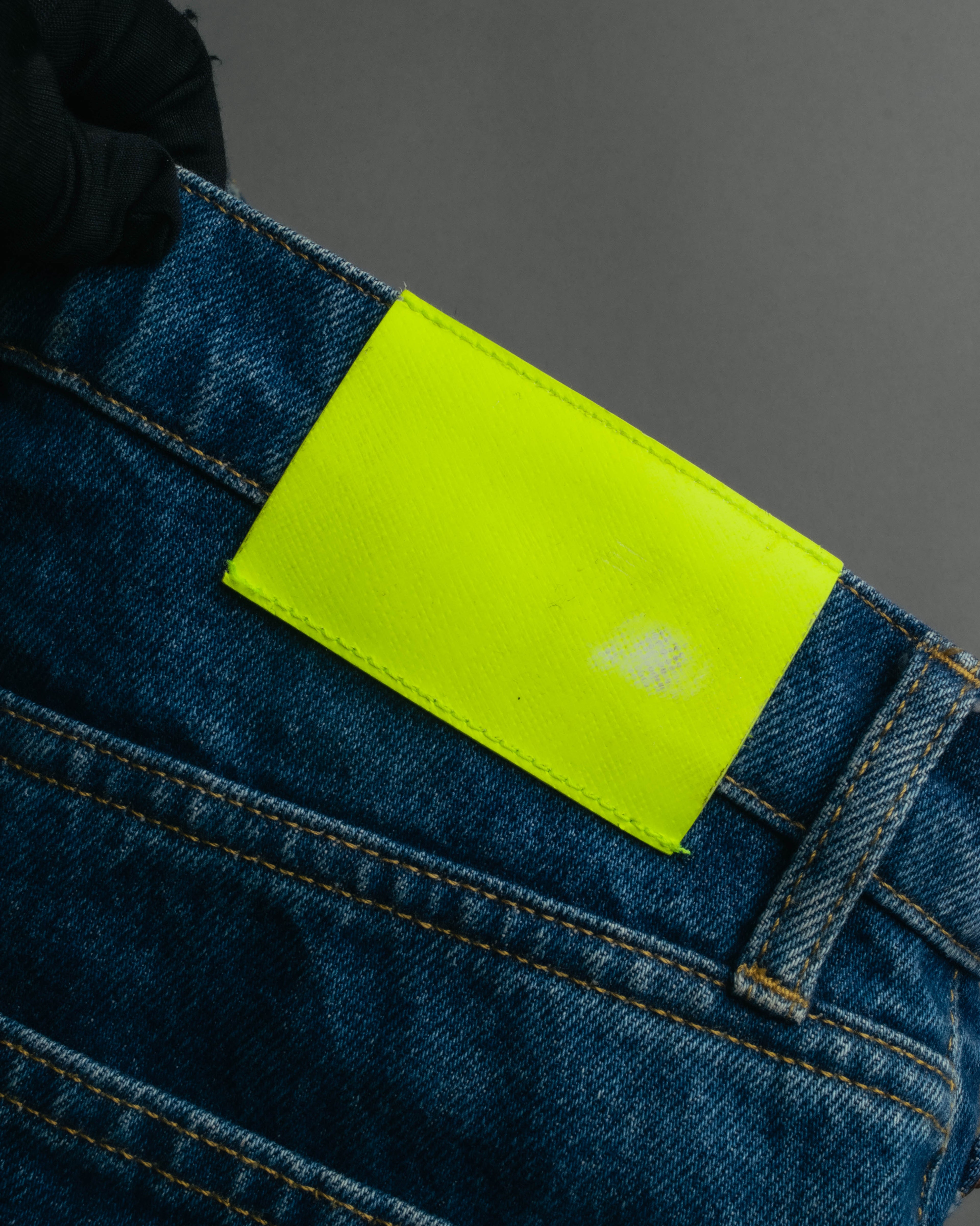 “Balenciaga” 2016-18’s tapered denim pants with neon back patch