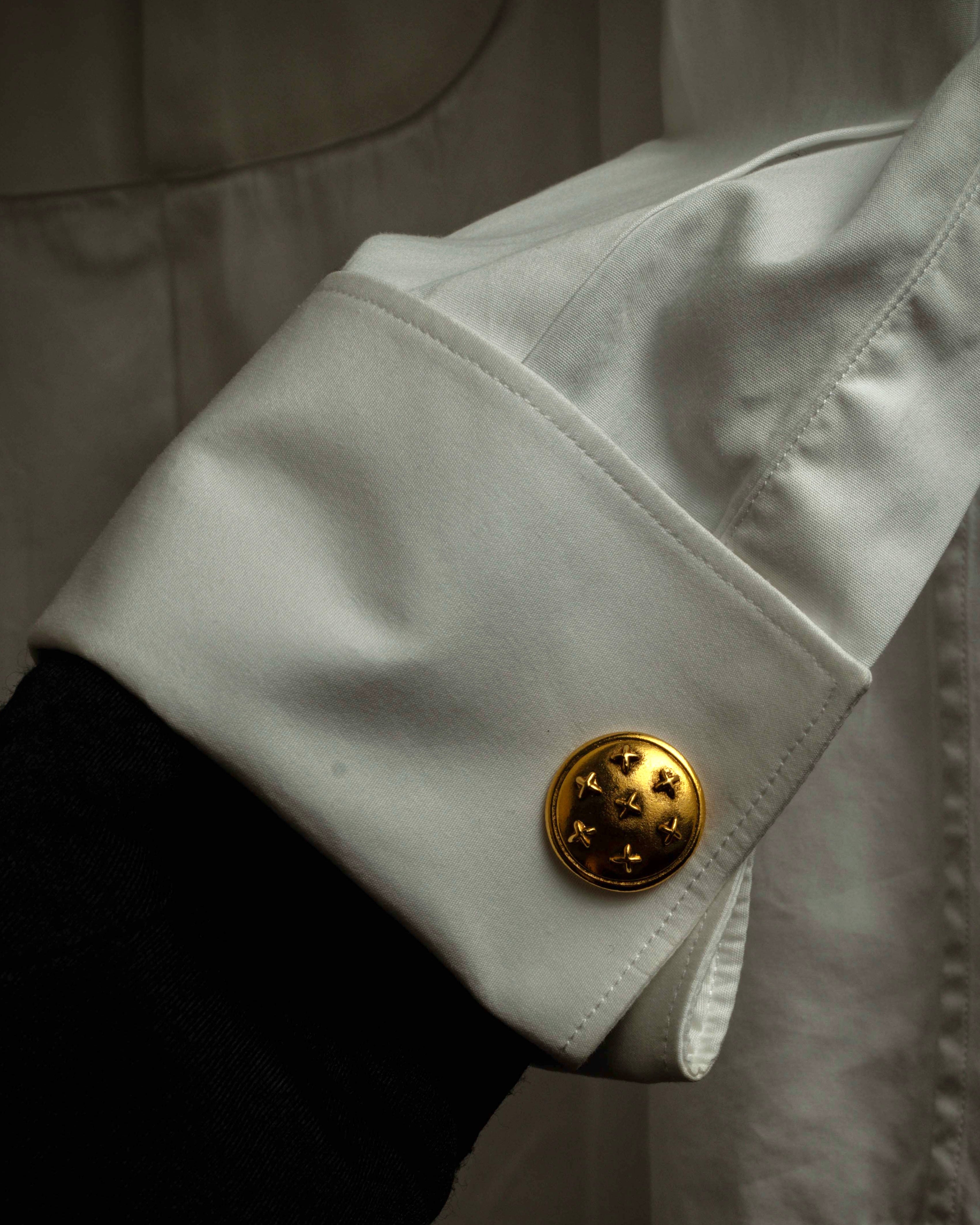 "CHANEL" Dome relief cross motif gold cufflinks