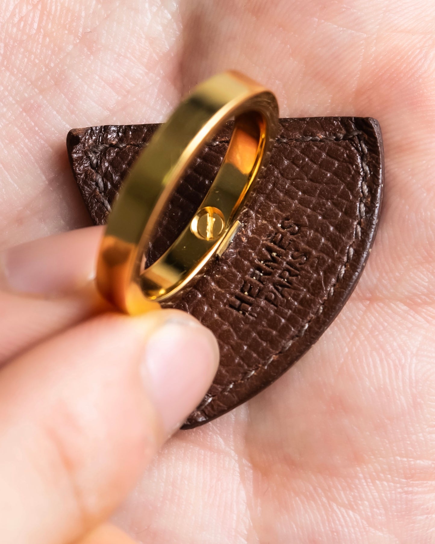 "HERMES" Gold & brown leather scarf ring