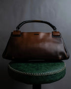 "GUCCI" Horizontally shaped cord-wrapped handle leather bag