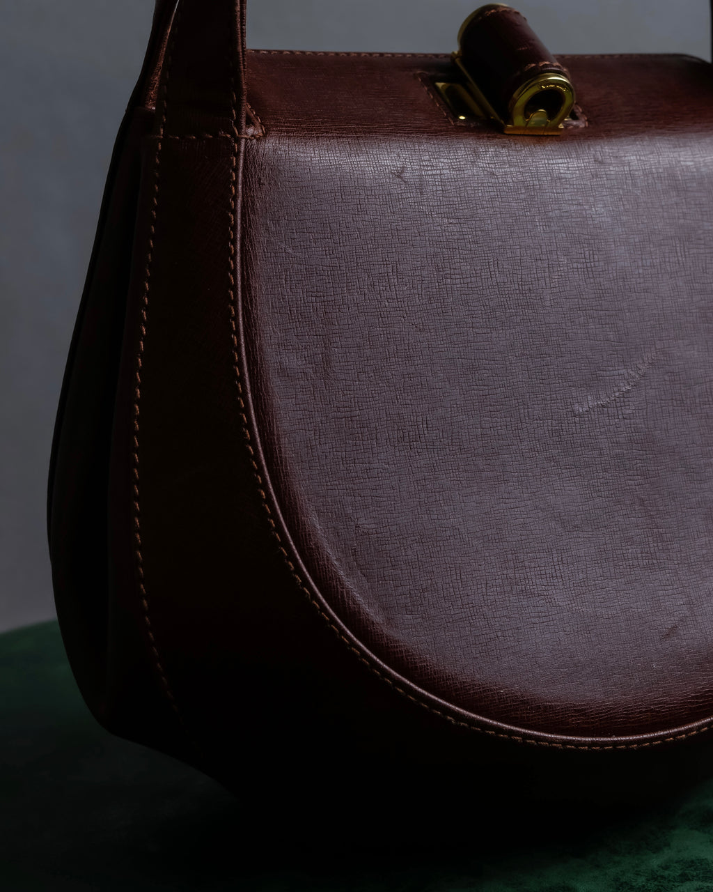 "Salvatore Ferragamo" Half-moon shaped Bordeaux color leather shoulder bag