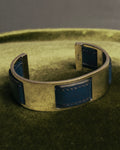 “HERMÈS” 90’s-00’s Leather inset gold metal cuff bangle