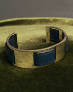 “HERMÈS” 90’s-00’s Leather inset gold metal cuff bangle