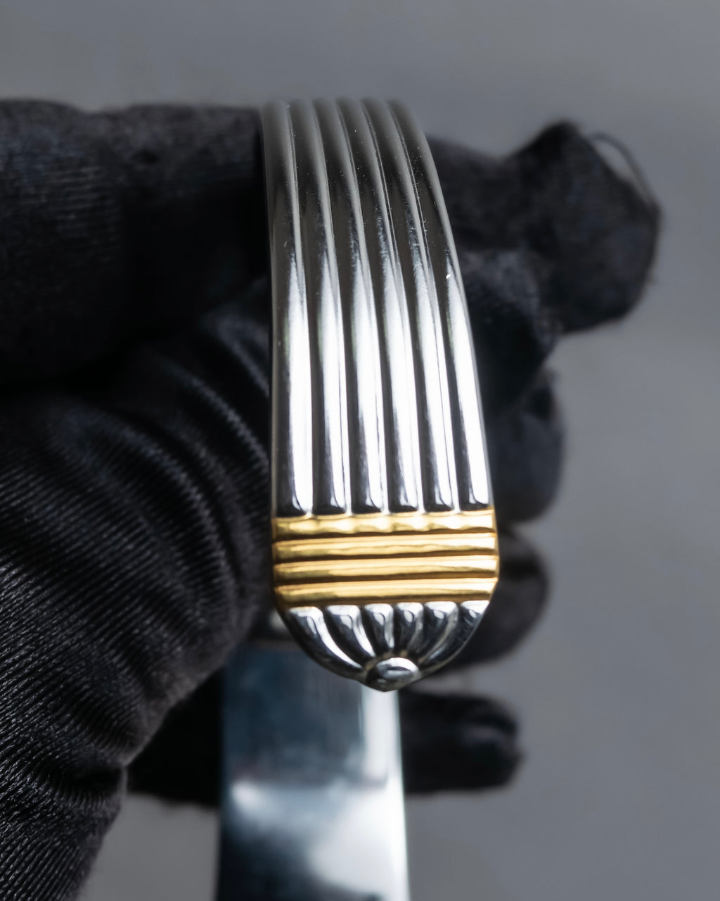 "Christian Dior" Ribbed design gold combination polished silver bangle