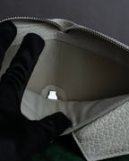 "MAISON MARGIELA" White grain leather round zipper wallet