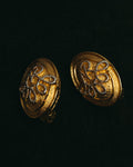 “Nina Ricci” 80's-90's Gold-tone floral clip-on earrings