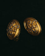 “Nina Ricci” 80's-90's Gold-tone floral clip-on earrings